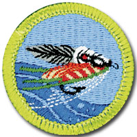 Fly fishing merit badge for Boy Scouts, featuring ornately tied casting fly