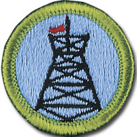 Pioneering merit badge for Boy Scouts, with headframe and flag